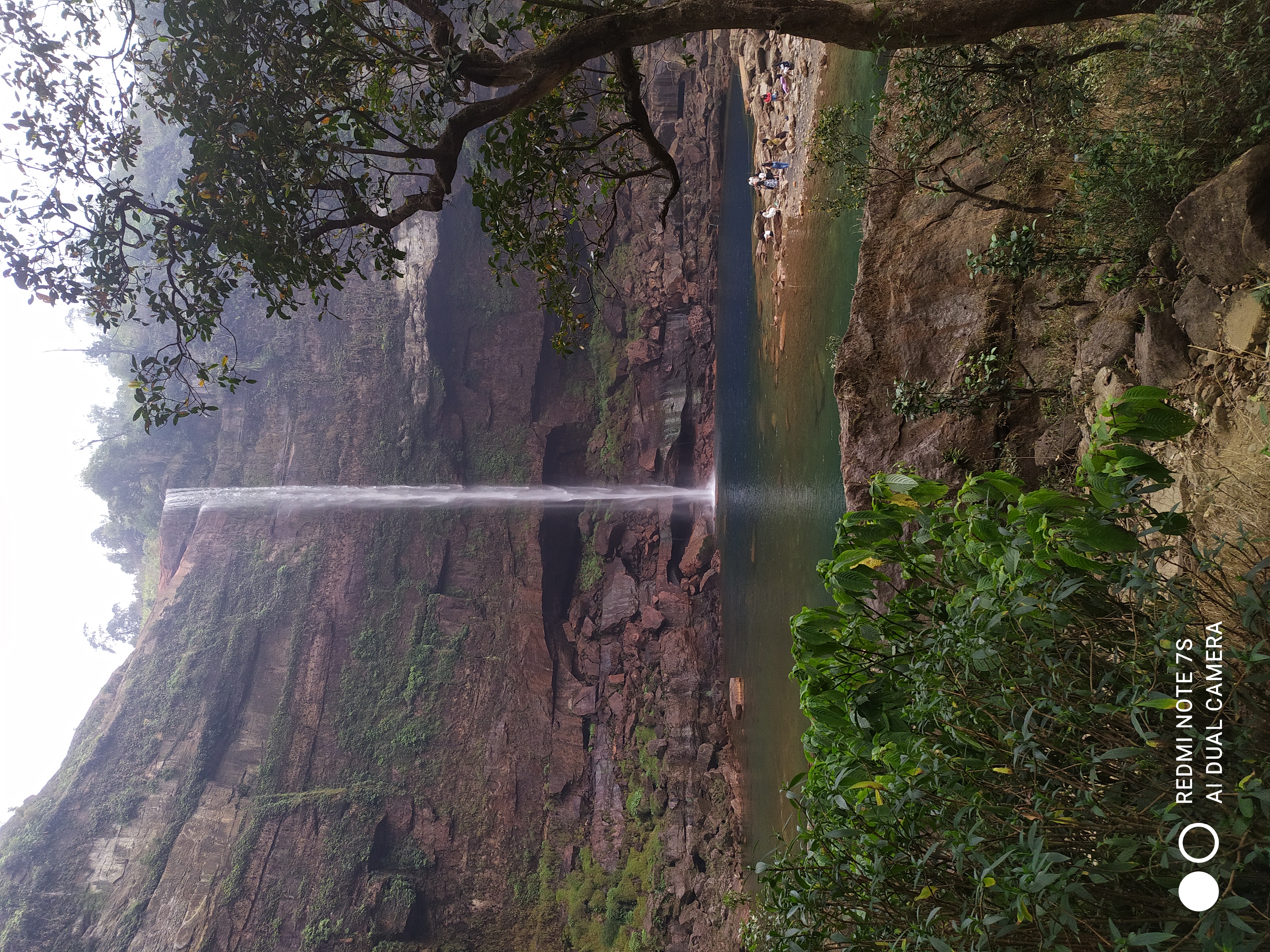 Waterfall Over Red Cliff