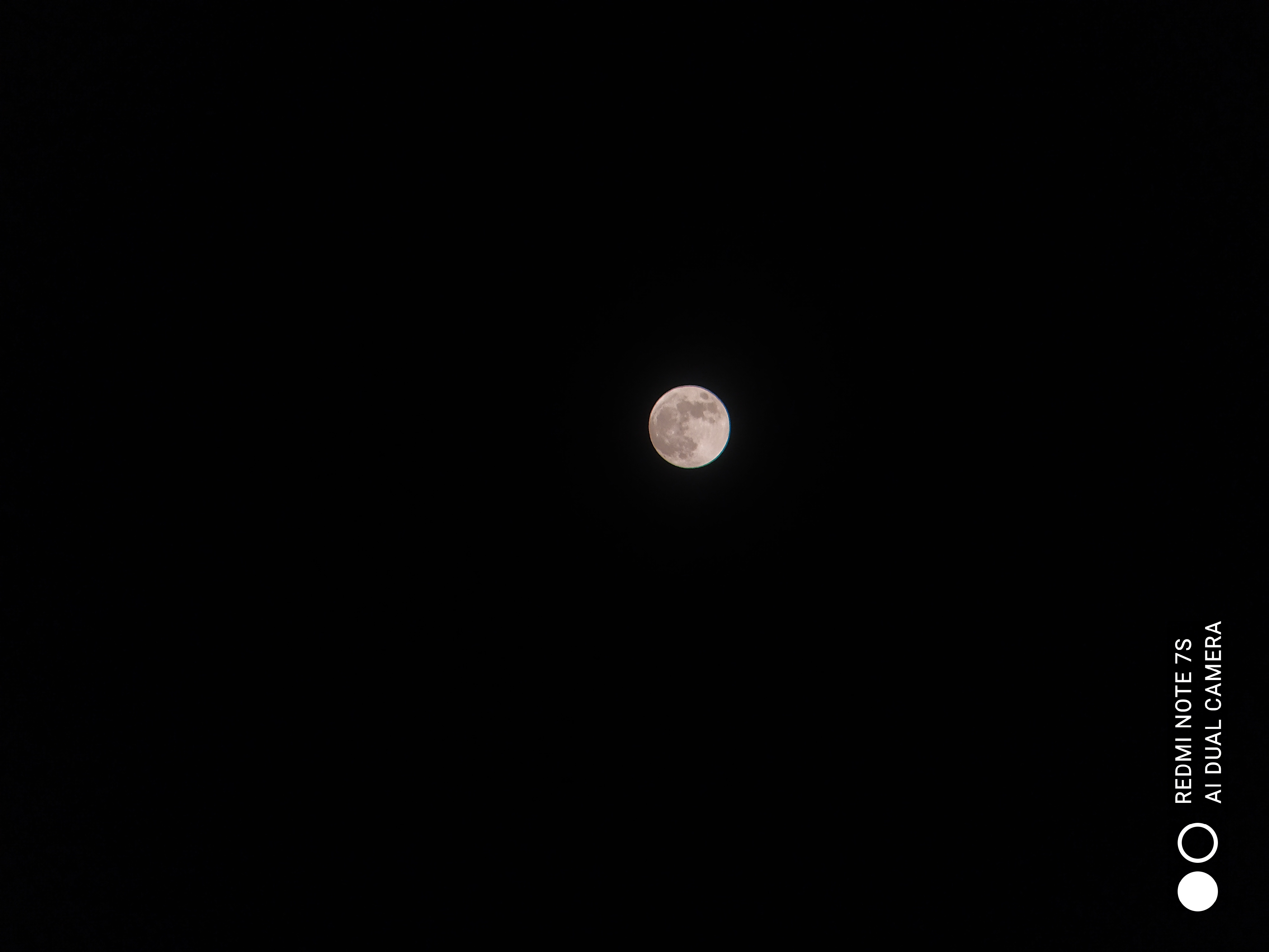 Moon Against Deep Black